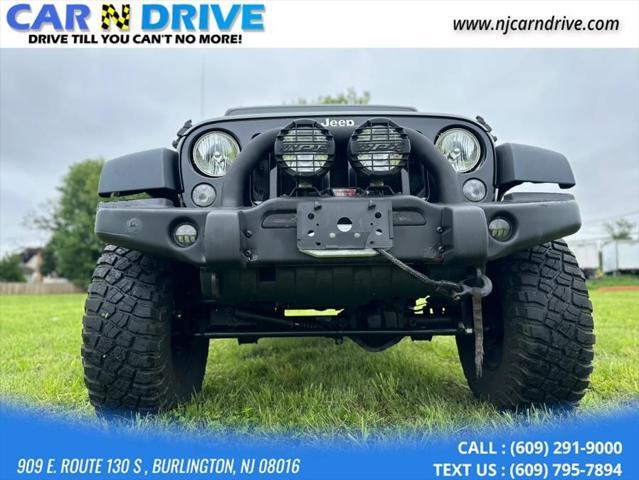 used 2014 Jeep Wrangler Unlimited car, priced at $16,985