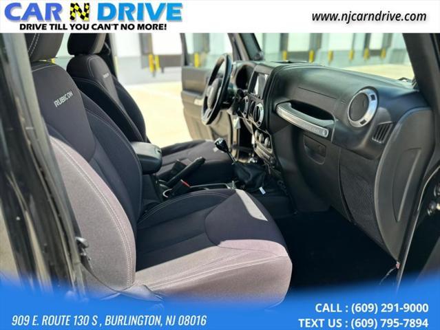 used 2014 Jeep Wrangler Unlimited car, priced at $17,544