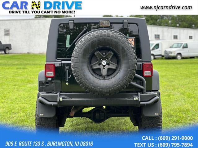 used 2014 Jeep Wrangler Unlimited car, priced at $16,985