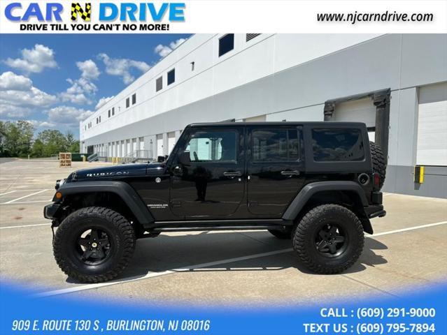 used 2014 Jeep Wrangler Unlimited car, priced at $17,544