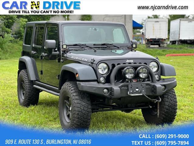 used 2014 Jeep Wrangler Unlimited car, priced at $16,985
