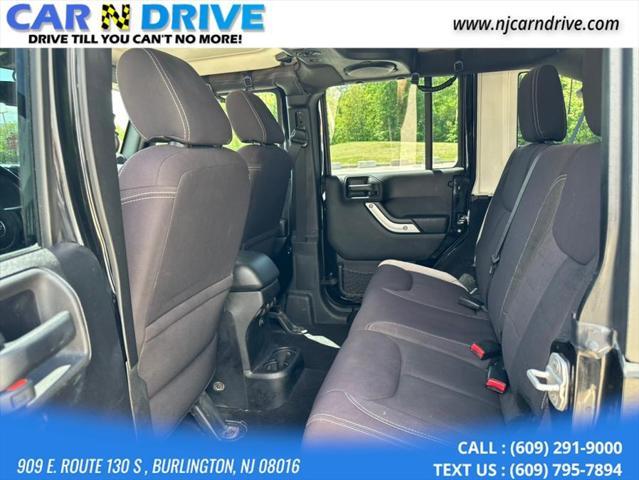 used 2014 Jeep Wrangler Unlimited car, priced at $17,544