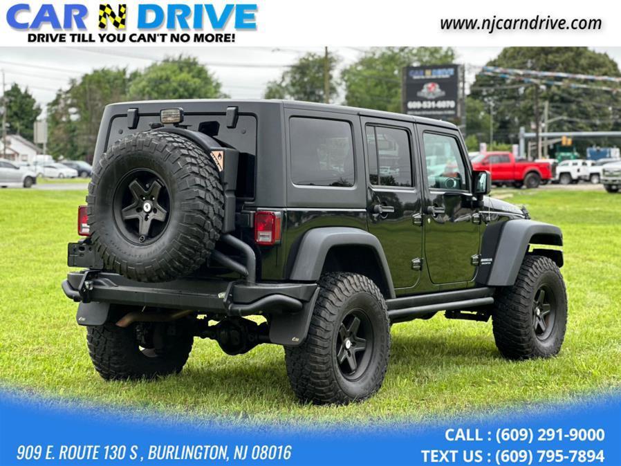 used 2014 Jeep Wrangler Unlimited car, priced at $16,499