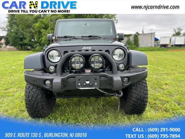 used 2014 Jeep Wrangler Unlimited car, priced at $16,985