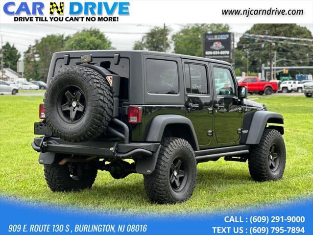 used 2014 Jeep Wrangler Unlimited car, priced at $16,985