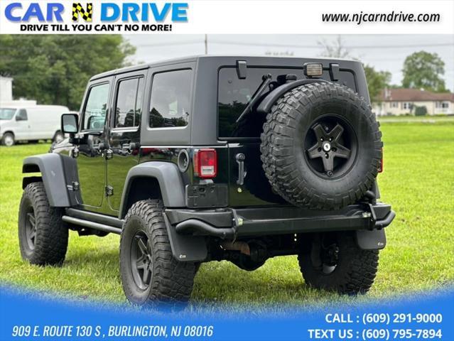 used 2014 Jeep Wrangler Unlimited car, priced at $16,985
