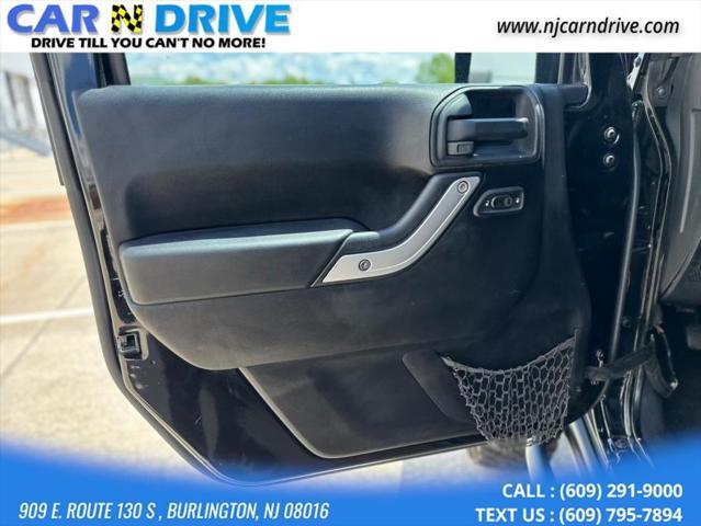 used 2014 Jeep Wrangler Unlimited car, priced at $17,544