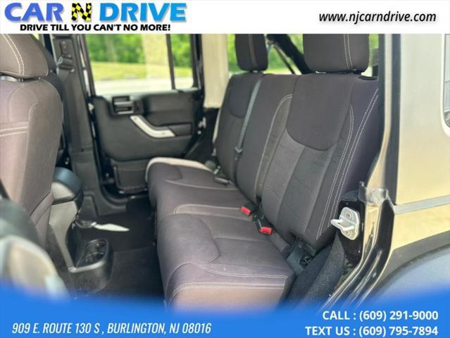 used 2014 Jeep Wrangler Unlimited car, priced at $17,544