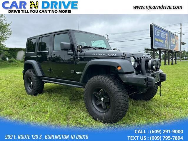used 2014 Jeep Wrangler Unlimited car, priced at $16,985