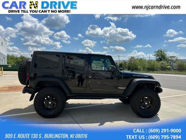 used 2014 Jeep Wrangler Unlimited car, priced at $17,544