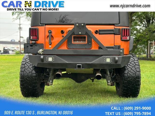 used 2011 Jeep Wrangler Unlimited car, priced at $13,500
