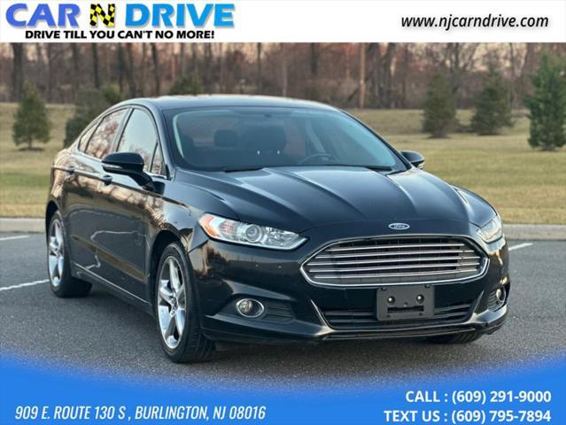 used 2016 Ford Fusion car, priced at $5,989