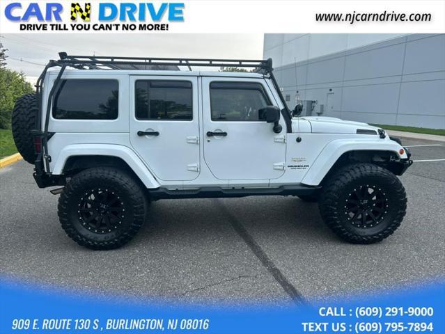 used 2013 Jeep Wrangler Unlimited car, priced at $15,899
