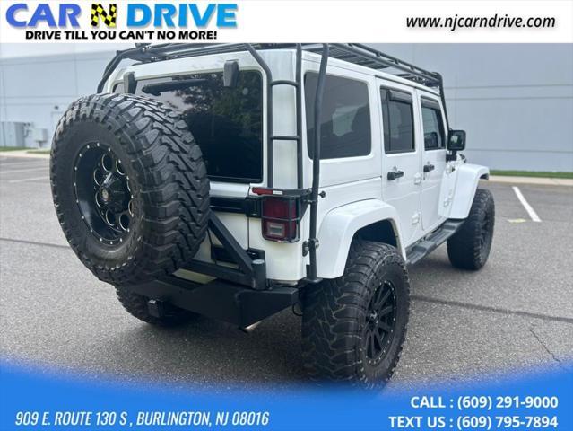 used 2013 Jeep Wrangler Unlimited car, priced at $15,899