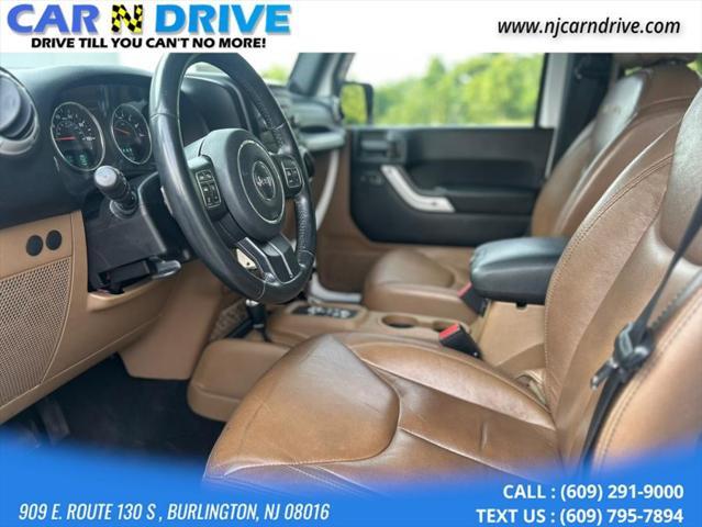 used 2013 Jeep Wrangler Unlimited car, priced at $15,899