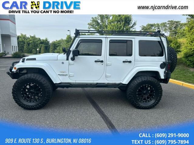 used 2013 Jeep Wrangler Unlimited car, priced at $15,899