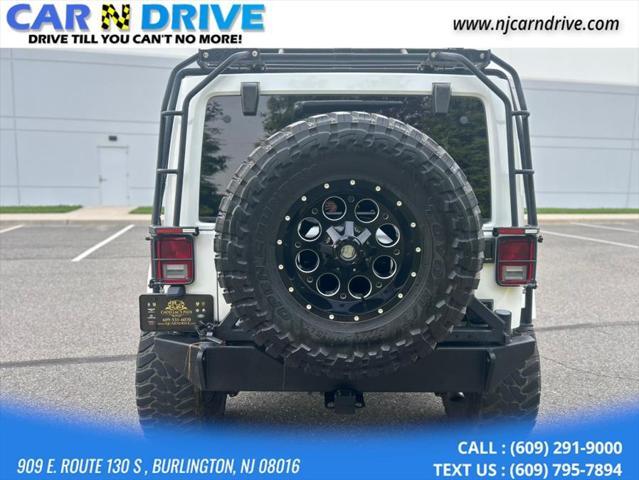 used 2013 Jeep Wrangler Unlimited car, priced at $15,899