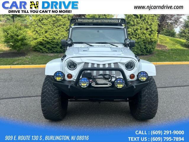 used 2013 Jeep Wrangler Unlimited car, priced at $15,899