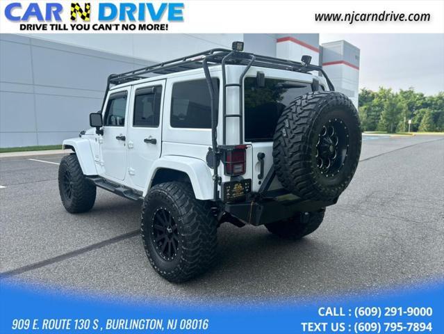 used 2013 Jeep Wrangler Unlimited car, priced at $15,899