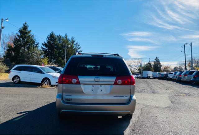 used 2007 Toyota Sienna car, priced at $9,999