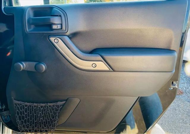 used 2015 Jeep Wrangler car, priced at $14,500