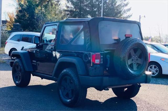 used 2015 Jeep Wrangler car, priced at $14,500