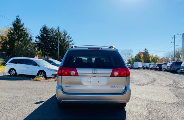 used 2006 Toyota Sienna car, priced at $10,999