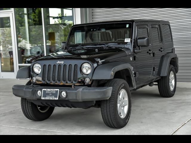 used 2014 Jeep Wrangler Unlimited car, priced at $13,995