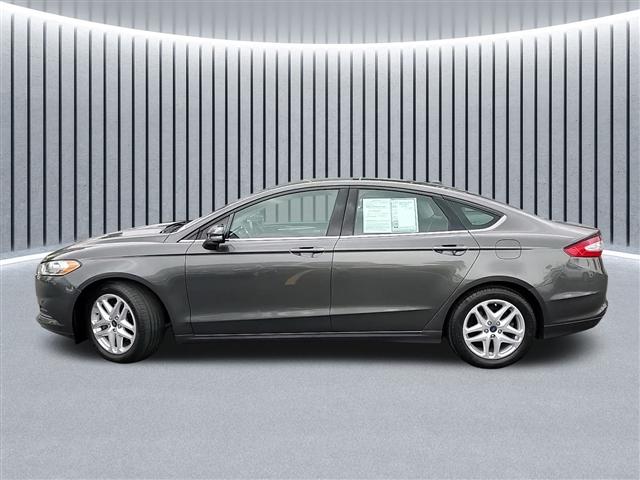 used 2016 Ford Fusion car, priced at $11,483