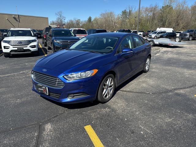used 2014 Ford Fusion car, priced at $7,599