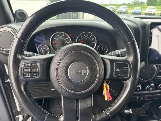used 2014 Jeep Wrangler Unlimited car, priced at $15,483