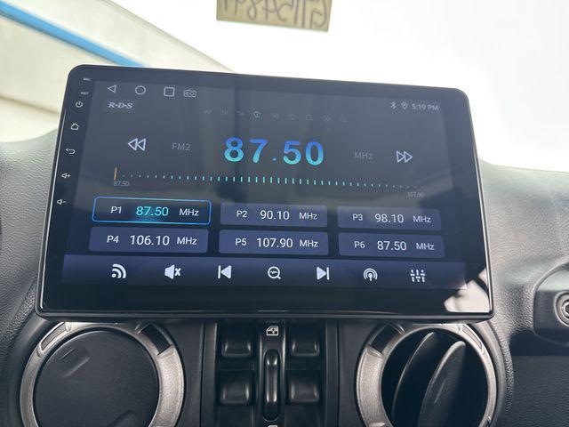 used 2014 Jeep Wrangler Unlimited car, priced at $15,483