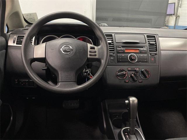 used 2011 Nissan Versa car, priced at $5,999