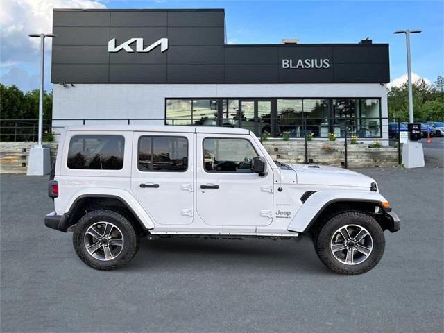 used 2023 Jeep Wrangler car, priced at $35,235