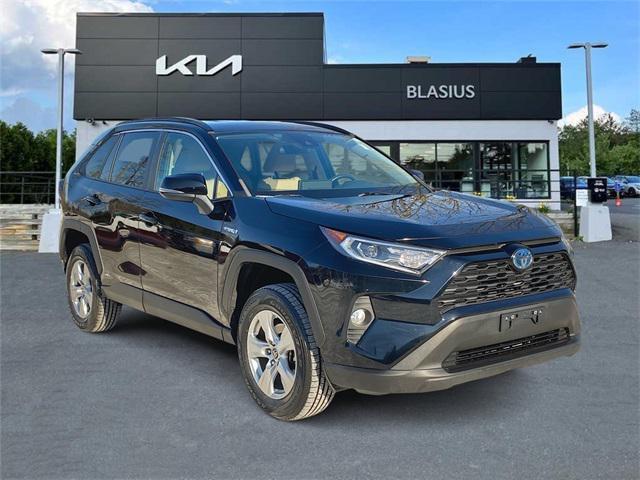 used 2021 Toyota RAV4 Hybrid car, priced at $28,405