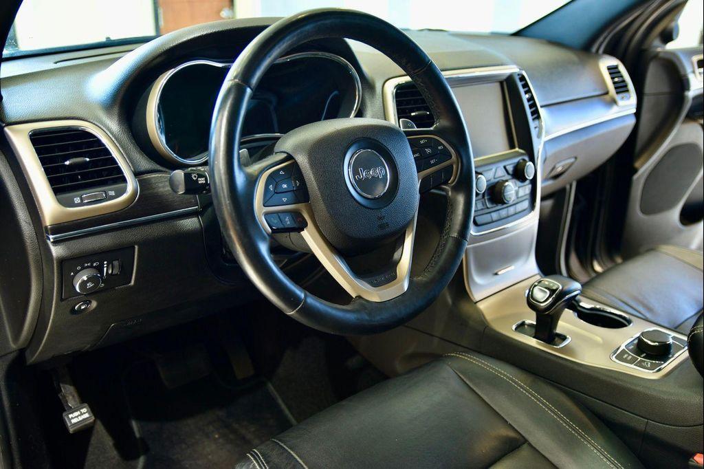 used 2014 Jeep Grand Cherokee car, priced at $11,990
