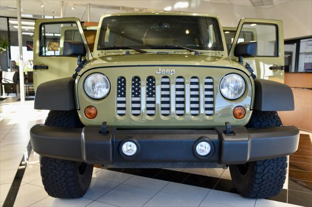 used 2013 Jeep Wrangler Unlimited car, priced at $15,990