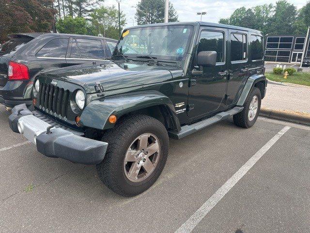 used 2011 Jeep Wrangler Unlimited car, priced at $15,987