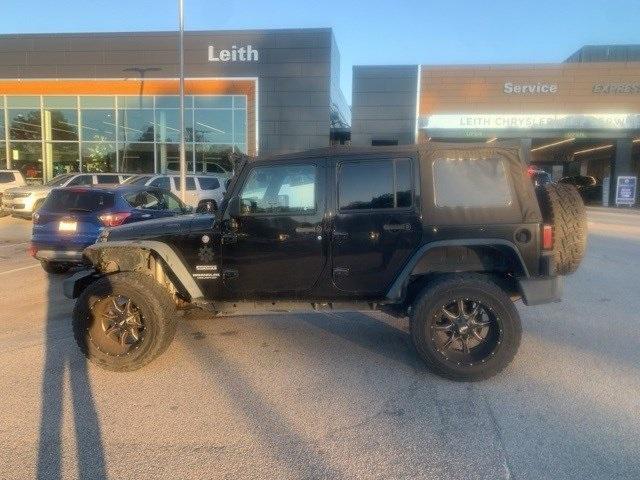 used 2014 Jeep Wrangler Unlimited car, priced at $16,475