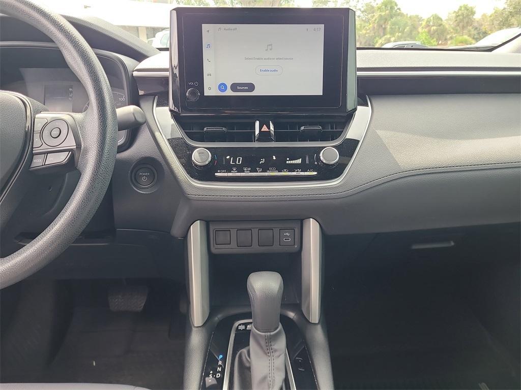 used 2024 Toyota Corolla Cross Hybrid car, priced at $28,499