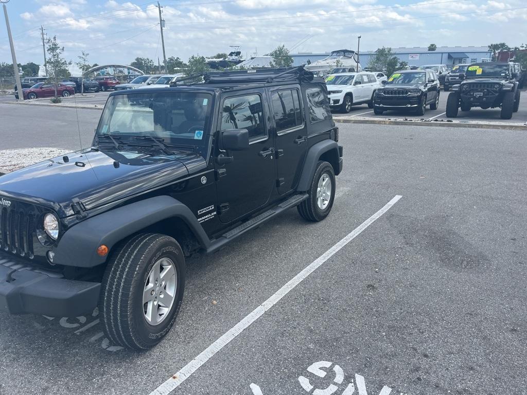 used 2015 Jeep Wrangler Unlimited car, priced at $18,399