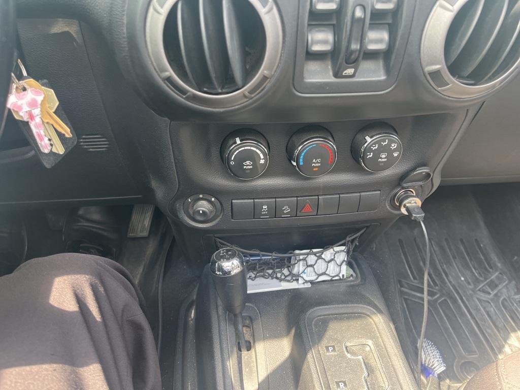 used 2015 Jeep Wrangler Unlimited car, priced at $18,399