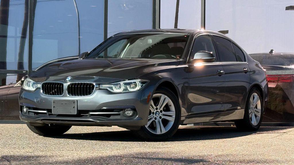 used 2018 BMW 330 car, priced at $13,990