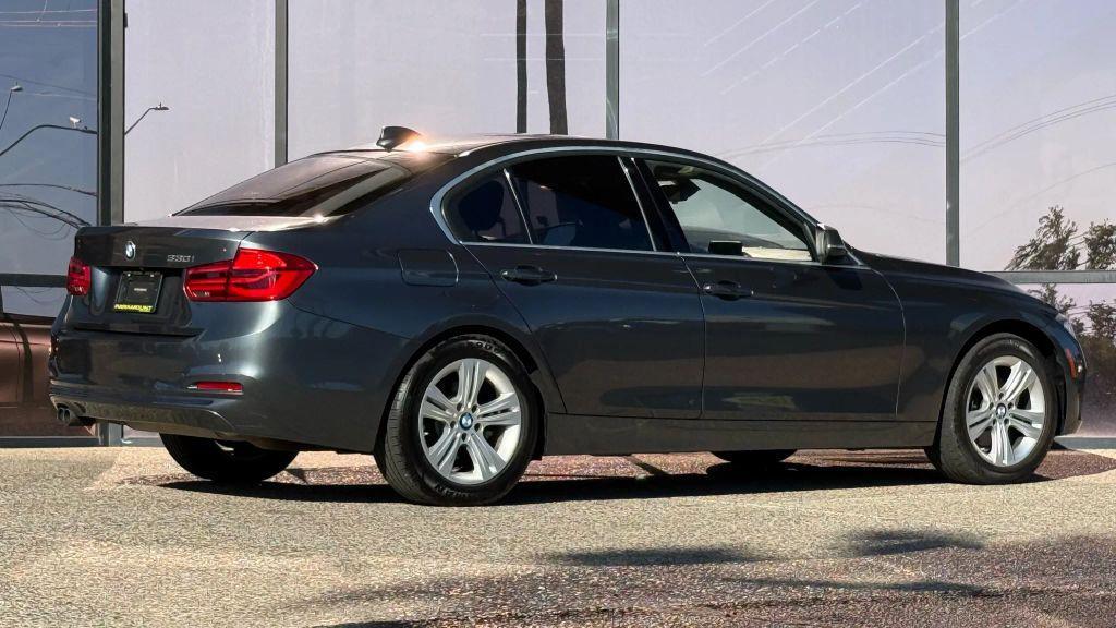 used 2018 BMW 330 car, priced at $13,990