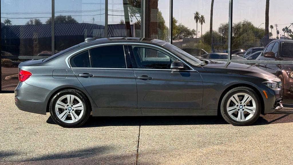 used 2018 BMW 330 car, priced at $13,990