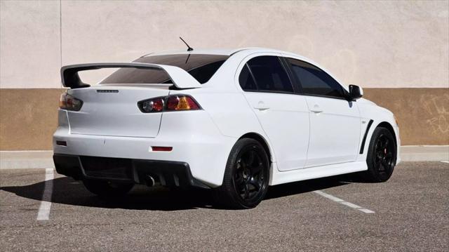 used 2011 Mitsubishi Lancer Evolution car, priced at $27,990