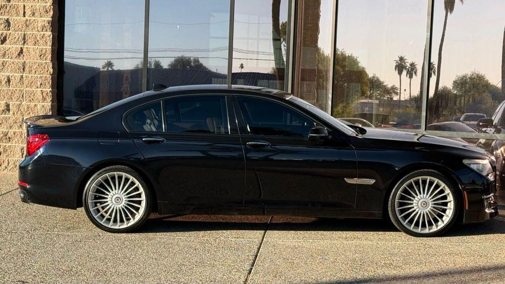 used 2013 BMW 750 car, priced at $17,990