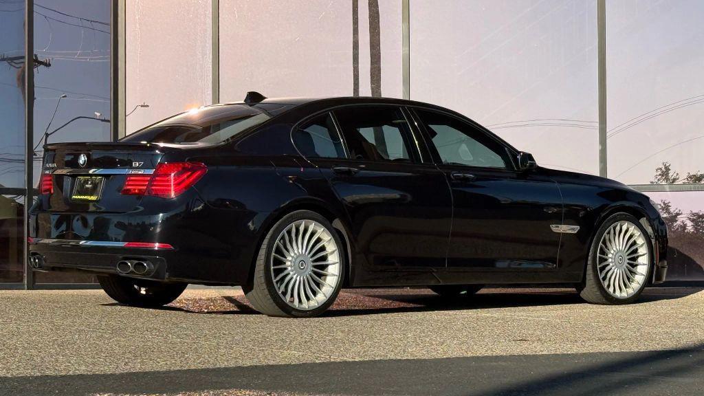 used 2013 BMW 750 car, priced at $17,990
