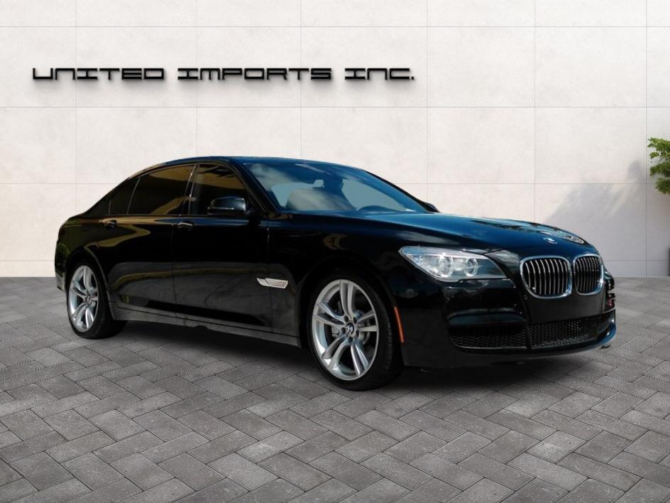 used 2014 BMW 750 car, priced at $14,850
