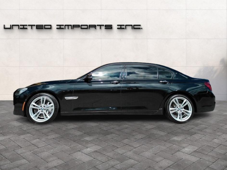 used 2014 BMW 750 car, priced at $14,850